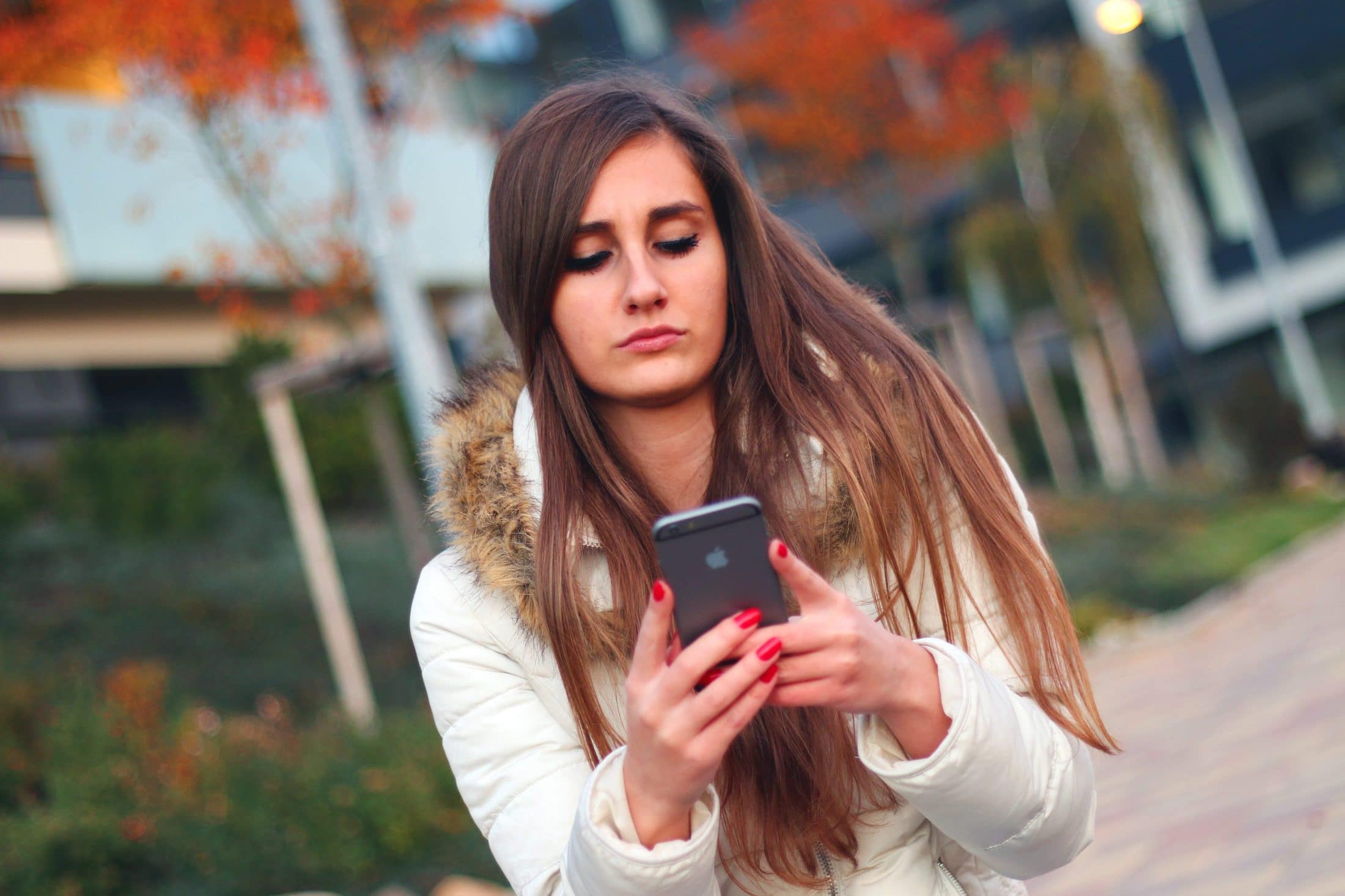 person-woman-apple-iphone texting