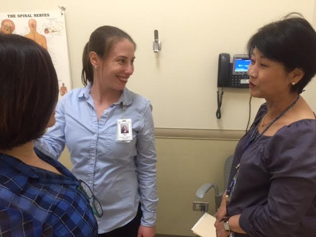 Kyung Yu provides translation services for hospital staff and Korean-speaking patients.