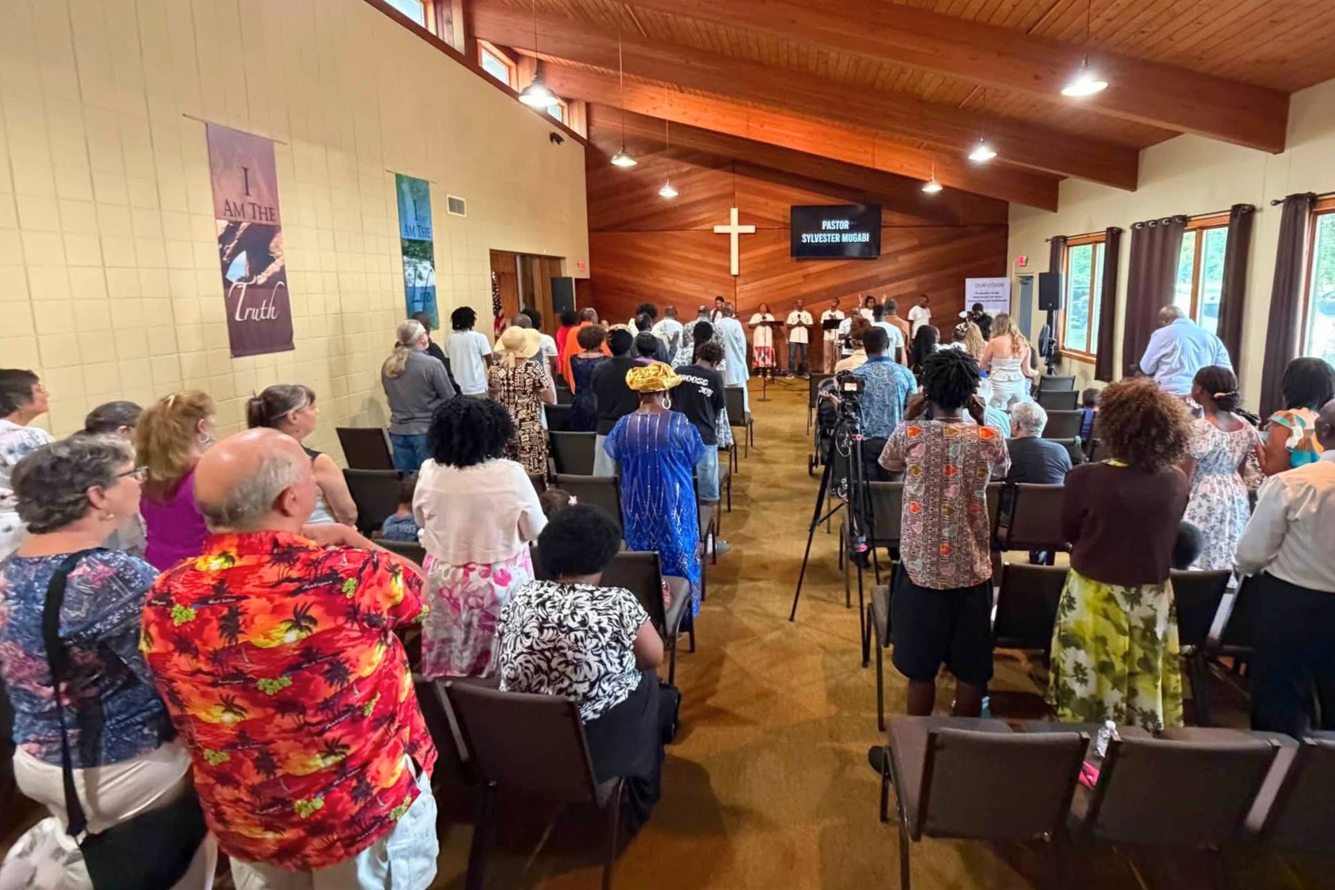 Bridgeway Church and International Mission Fellowship, a Ugandan congregation that worships in the same building, come together for a special unity service.